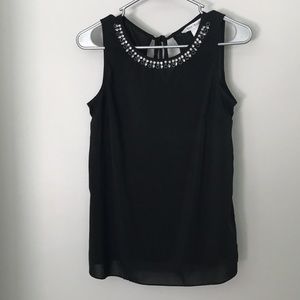 Black sleeveless shirt with sequins and tie back